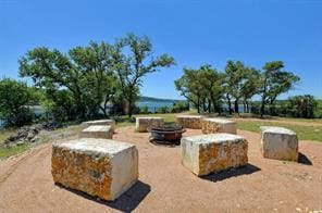 7901 Sunrise Ravine Pass, Lago Vista, TX 78645 - view of patio / terrace featuring a fire pit