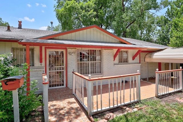 4705 Enchanted Ln, Austin, TX 78745 - view of front of home featuring brick siding and roof with shingles