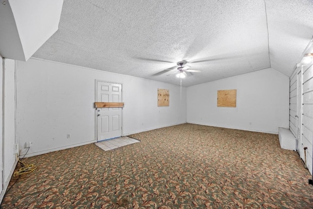 4705 Enchanted Ln, Austin, TX 78745 - additional living space featuring carpet flooring, a ceiling fan, a textured ceiling, and lofted ceiling