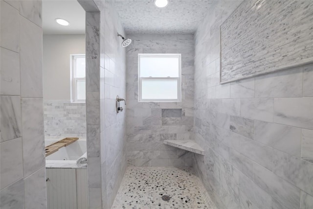 2119 Rabb Rd, Austin, TX 78704 - bathroom with a tile shower and tile walls