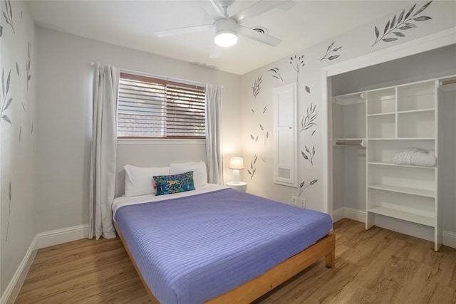 2119 Rabb Rd, Austin, TX 78704 - bedroom featuring wood finished floors, a closet, and ceiling fan