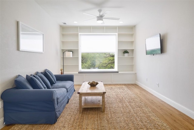 2119 Rabb Rd, Austin, TX 78704 - living area with wood finished floors and ceiling fan