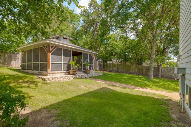 2119 Rabb Rd, Austin, TX 78704 - fenced backyard featuring a storage unit and a sunroom