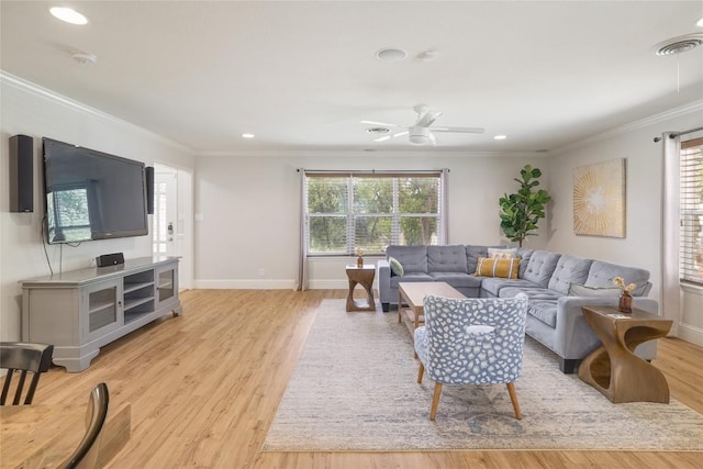 2119 Rabb Rd, Austin, TX 78704 - living room featuring healthy amount of natural light, ornamental molding, light wood-style floors, a ceiling fan, and recessed lighting