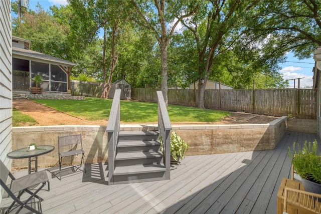 2119 Rabb Rd, Austin, TX 78704 - deck featuring a fenced backyard, a shed, and a sunroom
