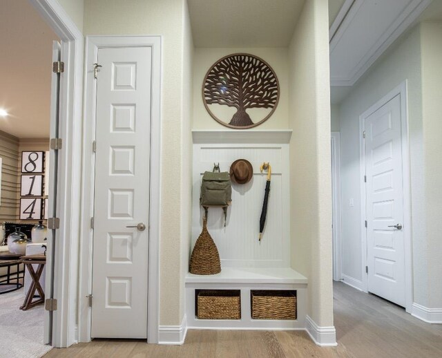 106 Double Eagle Ranch Dr, Cedar Creek, TX 78612 - mudroom with wood finished floors and baseboards