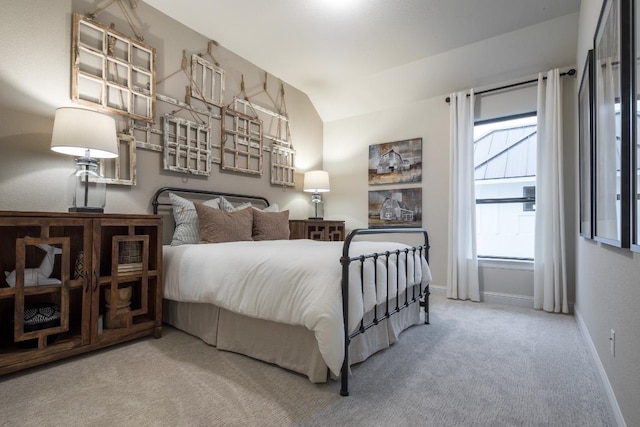106 Double Eagle Ranch Dr, Cedar Creek, TX 78612 - bedroom featuring carpet and vaulted ceiling
