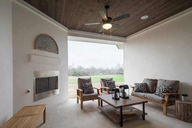 106 Double Eagle Ranch Dr, Cedar Creek, TX 78612 - view of patio / terrace featuring a ceiling fan and an outdoor living space with a fireplace