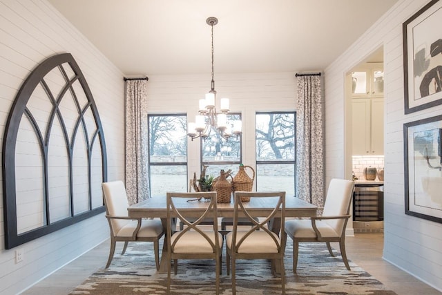 106 Double Eagle Ranch Dr, Cedar Creek, TX 78612 - dining space with wood finished floors, a chandelier, and plenty of natural light