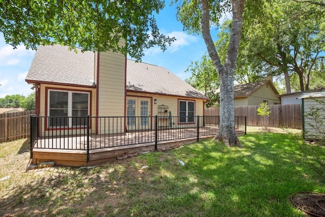 2810 Goldbridge Dr, Austin, TX 78745 - back of property with a patio, a fenced backyard, a shingled roof, a chimney, and french doors
