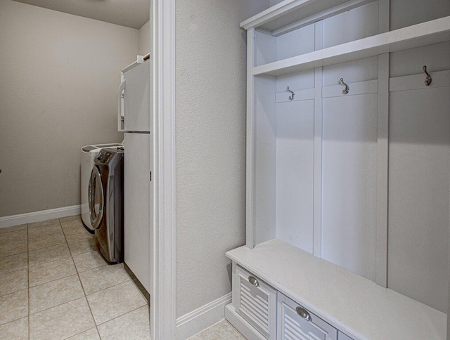 5821 Viejo Dr, Austin, TX 78738 - mudroom with washer and dryer and light tile patterned flooring