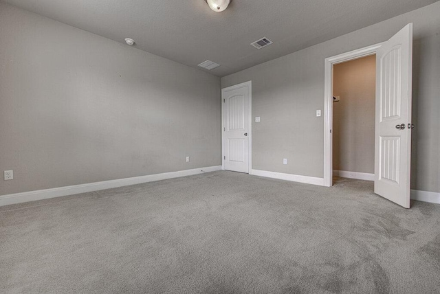 5821 Viejo Dr, Austin, TX 78738 - unfurnished bedroom with carpet floors and baseboards