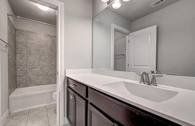 5821 Viejo Dr, Austin, TX 78738 - bathroom with vanity, bathing tub / shower combination, tile patterned floors, and a textured ceiling