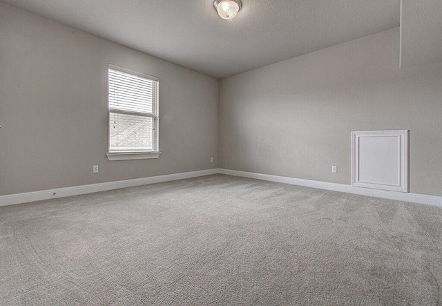 5821 Viejo Dr, Austin, TX 78738 - carpeted empty room with baseboards