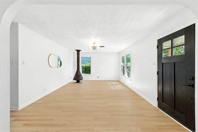 1302 S 2nd St, Killeen, TX 76541 - foyer featuring light wood finished floors and arched walkways