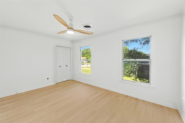 1302 S 2nd St, Killeen, TX 76541 - spare room with light wood finished floors, plenty of natural light, and ceiling fan