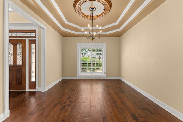 4206 River Place Blvd, Austin, TX 78730 - entryway featuring a raised ceiling, a chandelier, crown molding, and dark wood-style flooring