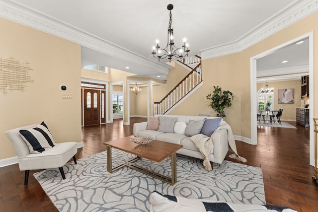 4206 River Place Blvd, Austin, TX 78730 - living room with a chandelier, ornamental molding, wood-type flooring, stairs, and recessed lighting