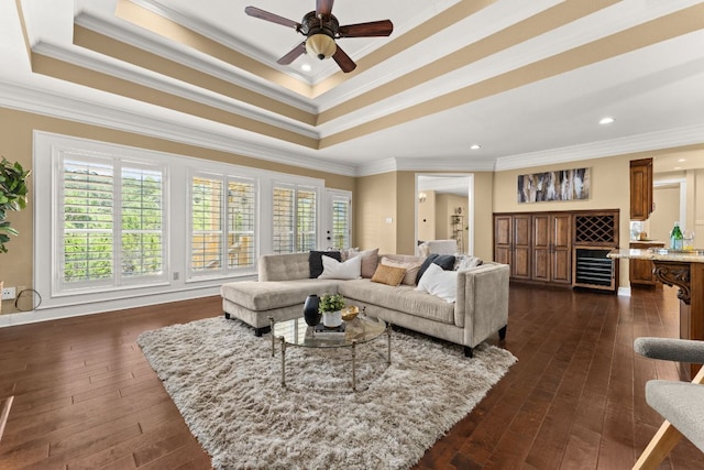 4206 River Place Blvd, Austin, TX 78730 - living area featuring crown molding, dark wood finished floors, a tray ceiling, a ceiling fan, and beverage cooler