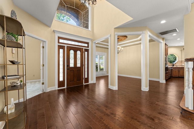 4206 River Place Blvd, Austin, TX 78730 - foyer entrance with dark wood-style floors, a chandelier, and recessed lighting