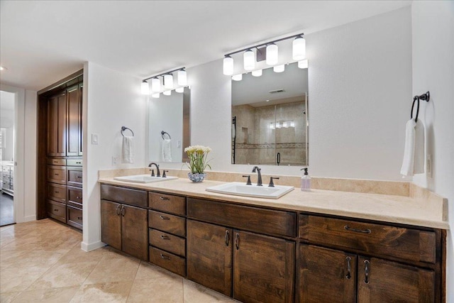 110 W Eagle Dr, The Hills, TX 78738 - full bath with double vanity, a shower stall, and tile patterned floors