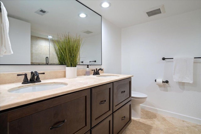 110 W Eagle Dr, The Hills, TX 78738 - bathroom featuring double vanity, recessed lighting, and a shower