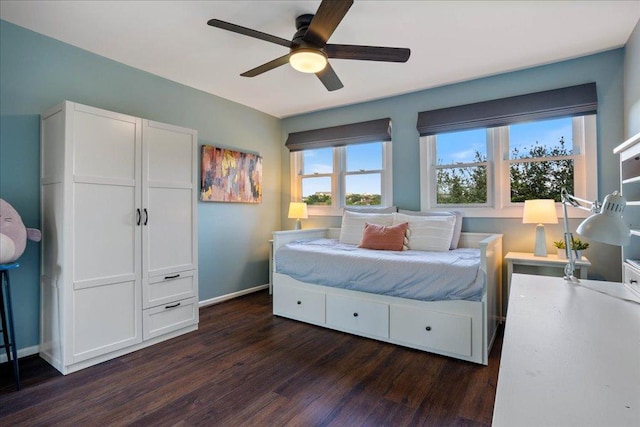 110 W Eagle Dr, The Hills, TX 78738 - bedroom with dark wood-style flooring and ceiling fan