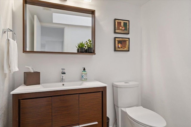 110 W Eagle Dr, The Hills, TX 78738 - half bath featuring vanity and toilet