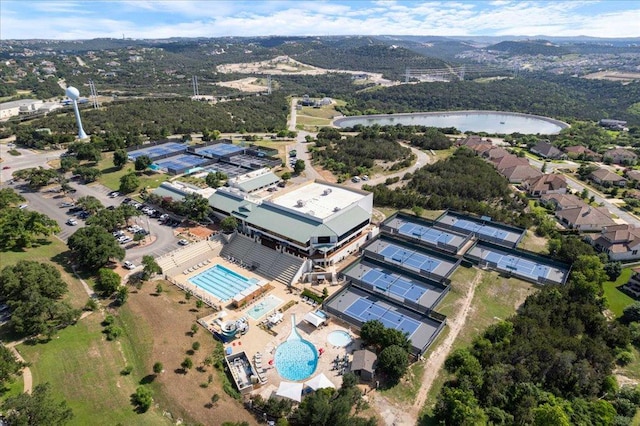 110 W Eagle Dr, The Hills, TX 78738 - aerial view of property's location with a pool and a large body of water