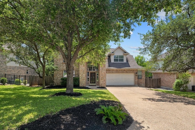 2743 Grimes Ranch Rd, Austin, TX 78732 - traditional home featuring driveway and brick siding