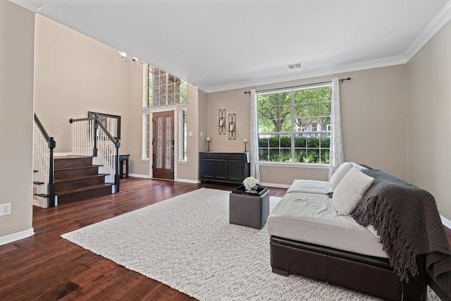 2743 Grimes Ranch Rd, Austin, TX 78732 - living room featuring wood finished floors, stairway, and ornamental molding