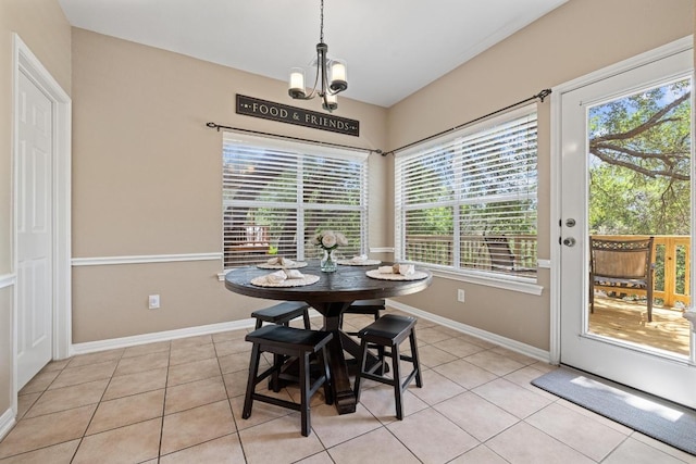 2743 Grimes Ranch Rd, Austin, TX 78732 - dining space featuring plenty of natural light, light tile patterned floors, and a chandelier