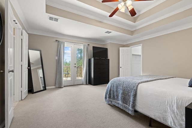 2743 Grimes Ranch Rd, Austin, TX 78732 - bedroom with light carpet, access to outside, crown molding, french doors, and a tray ceiling