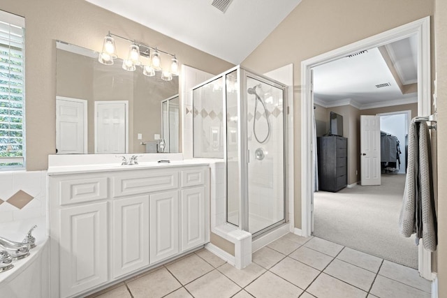 2743 Grimes Ranch Rd, Austin, TX 78732 - full bath with a stall shower, tile patterned floors, vanity, crown molding, and a bath