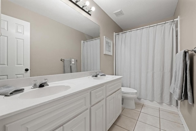 2743 Grimes Ranch Rd, Austin, TX 78732 - full bath with double vanity, tile patterned flooring, and a shower with curtain