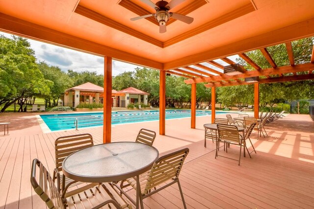 2743 Grimes Ranch Rd, Austin, TX 78732 - community pool with a pergola, ceiling fan, and outdoor dining space