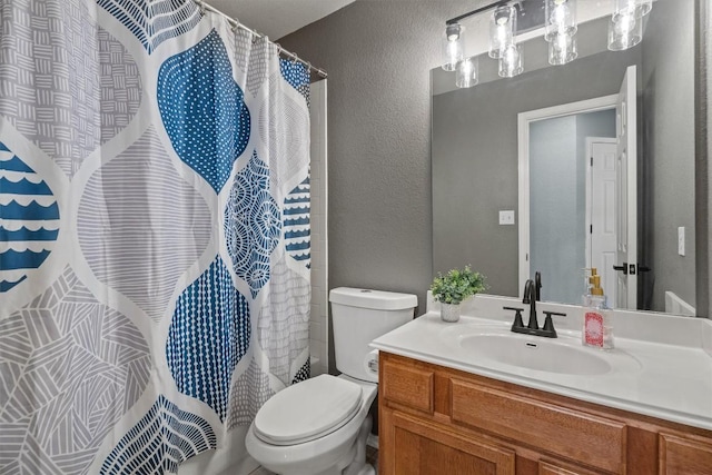 1503 Sherry Dr, Taylor, TX 76574 - bathroom with vanity, a textured wall, and a shower with curtain