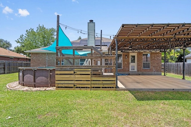1503 Sherry Dr, Taylor, TX 76574 - back of property with a patio and brick siding