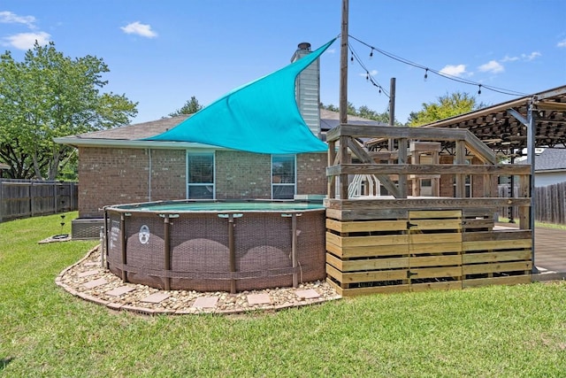 1503 Sherry Dr, Taylor, TX 76574 - rear view of property featuring brick siding and a chimney