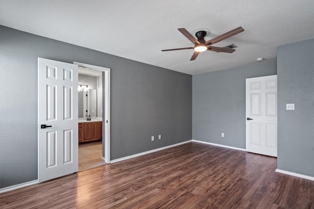 1503 Sherry Dr, Taylor, TX 76574 - spare room with ceiling fan and wood finished floors