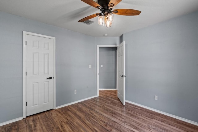 1503 Sherry Dr, Taylor, TX 76574 - unfurnished bedroom with wood finished floors and a ceiling fan