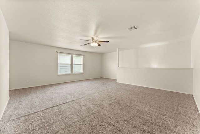 1305 Cozy Creek Dr, Temple, TX 76502 - spare room featuring ceiling fan, carpet flooring, and a textured ceiling