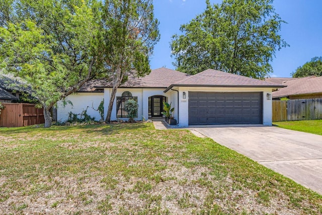 11325 Stormy Ridge Rd, Austin, TX 78739 - view of front of home featuring an attached garage, concrete driveway, and brick siding