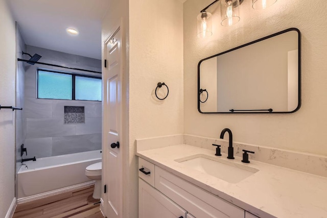 11325 Stormy Ridge Rd, Austin, TX 78739 - full bathroom featuring vanity, wood finished floors, and bathing tub / shower combination