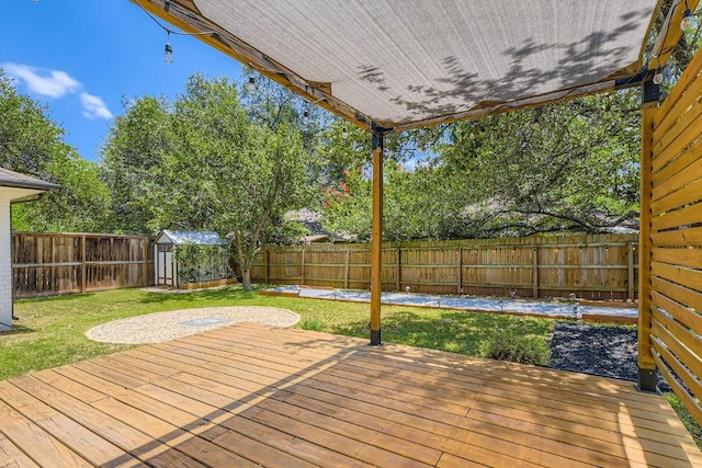 11325 Stormy Ridge Rd, Austin, TX 78739 - wooden deck with a storage shed and a fenced backyard