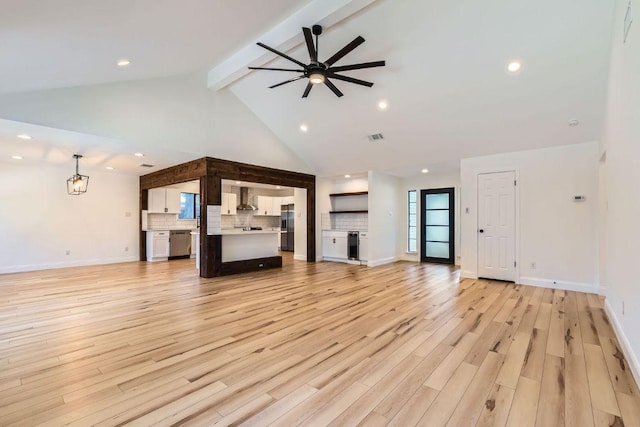 11325 Stormy Ridge Rd, Austin, TX 78739 - unfurnished living room featuring beam ceiling, light wood-style floors, ceiling fan, recessed lighting, and high vaulted ceiling