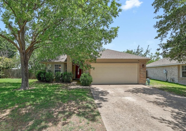 17729 Cahir Glen Cv, Pflugerville, TX 78660 - view of front of property featuring an attached garage, concrete driveway, and brick siding