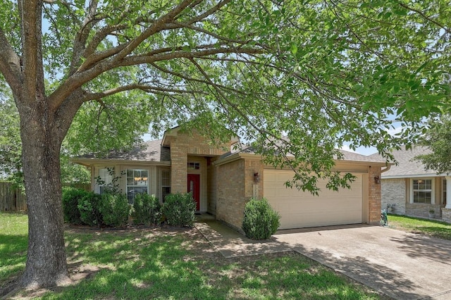 17729 Cahir Glen Cv, Pflugerville, TX 78660 - view of front of house with brick siding, a garage, and concrete driveway