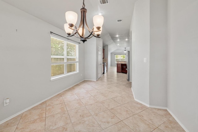 17729 Cahir Glen Cv, Pflugerville, TX 78660 - unfurnished room featuring a chandelier and light tile patterned flooring