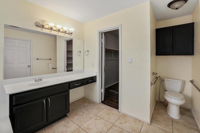 17729 Cahir Glen Cv, Pflugerville, TX 78660 - full bathroom with vanity, tile patterned floors, and a spacious closet
